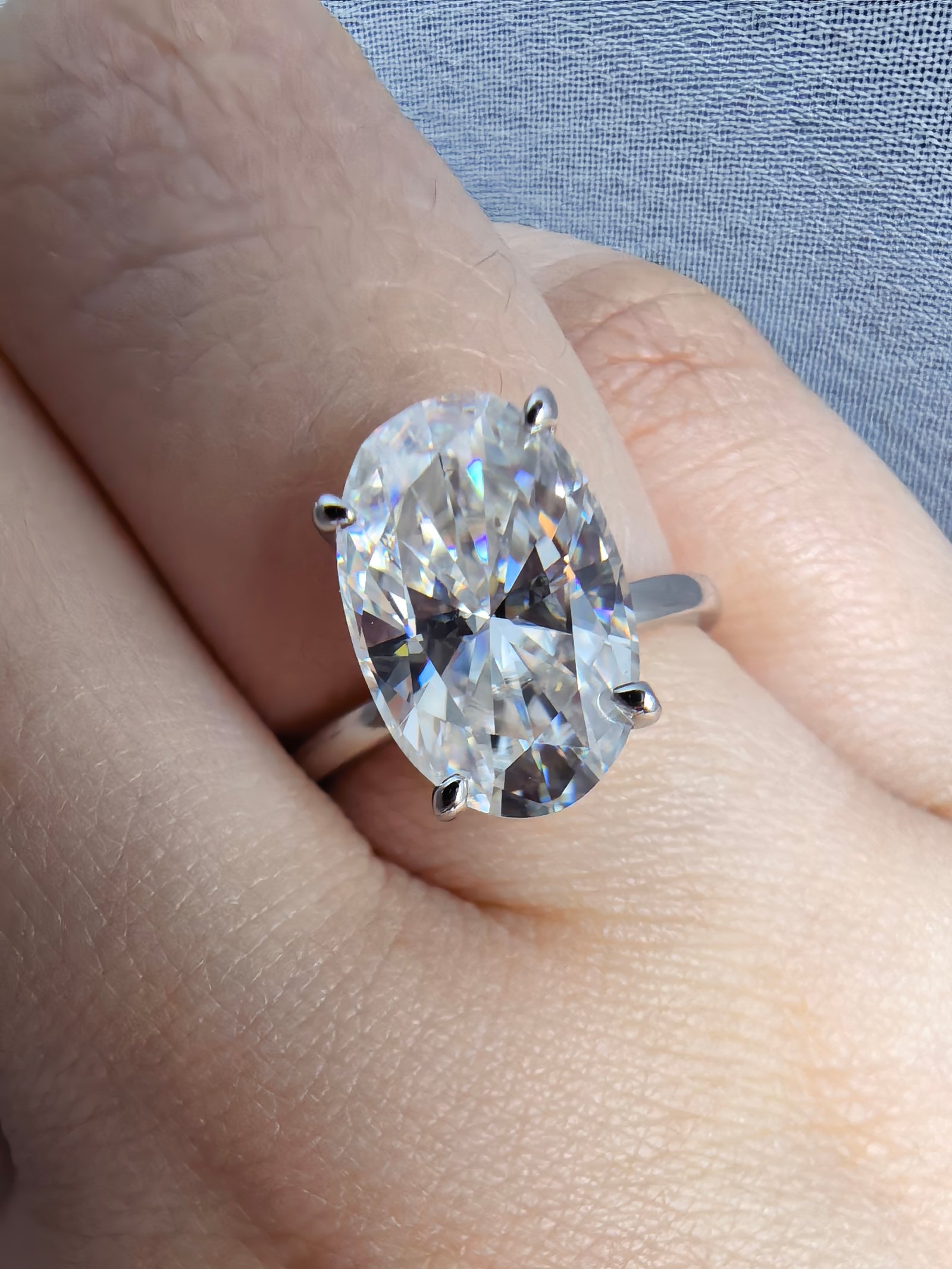 4.5 carat oval plain band engagement ring
