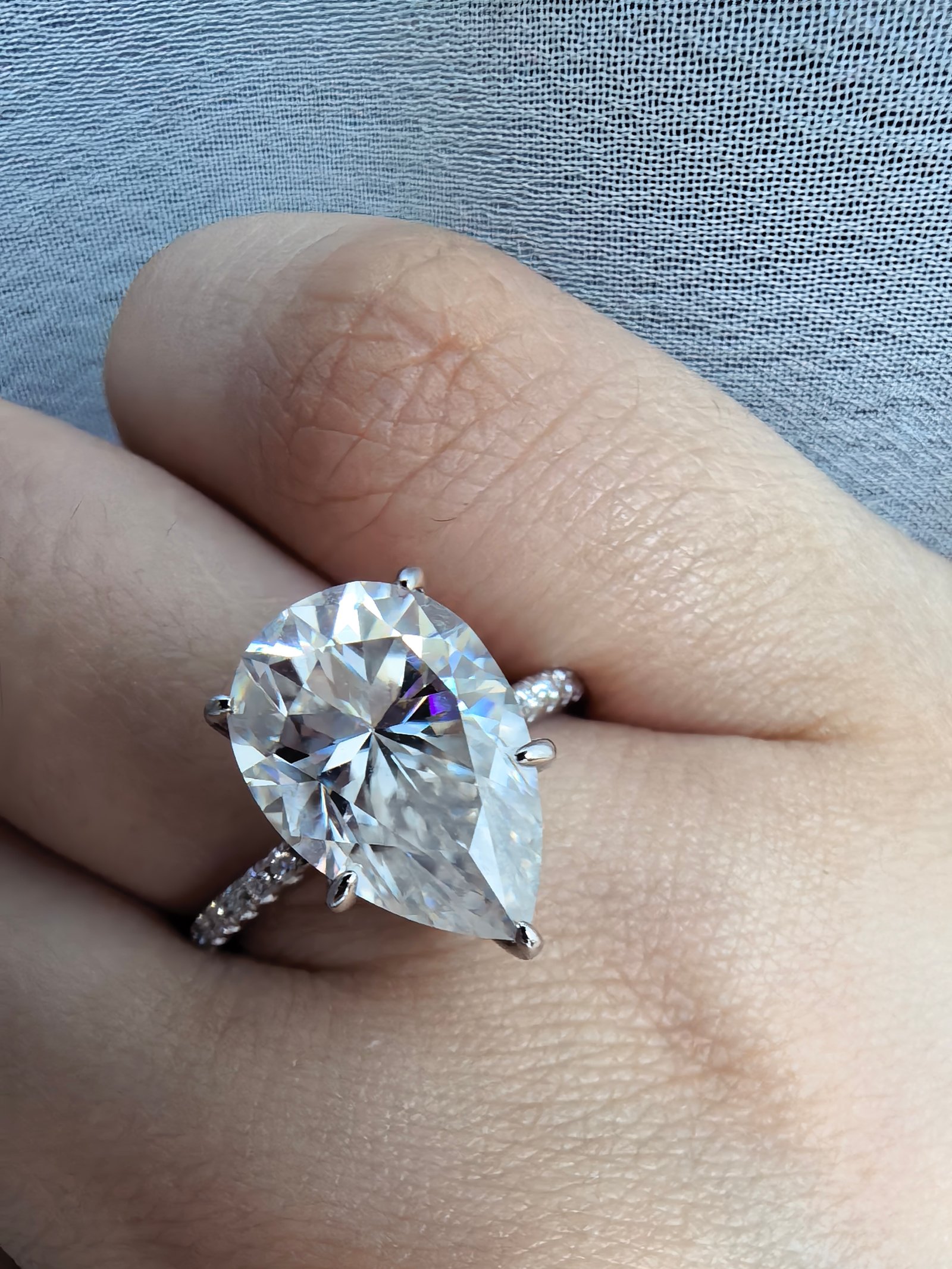 5 carat pear cut solitaire ring with side stones
